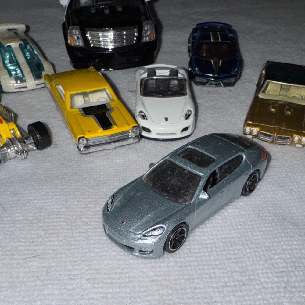 Die-Cast Toy Car Collection with Black, White, and Gold Vehicles - Picture 5 of 5